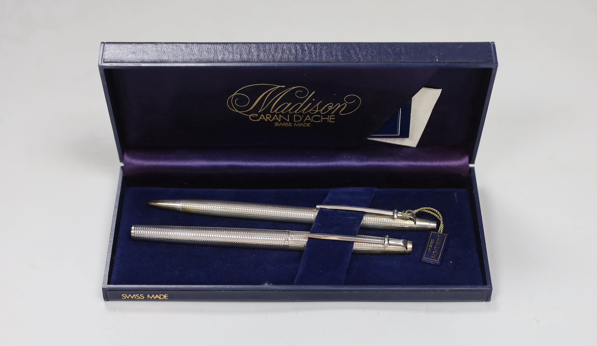 A cased Madison silver pen and pencil